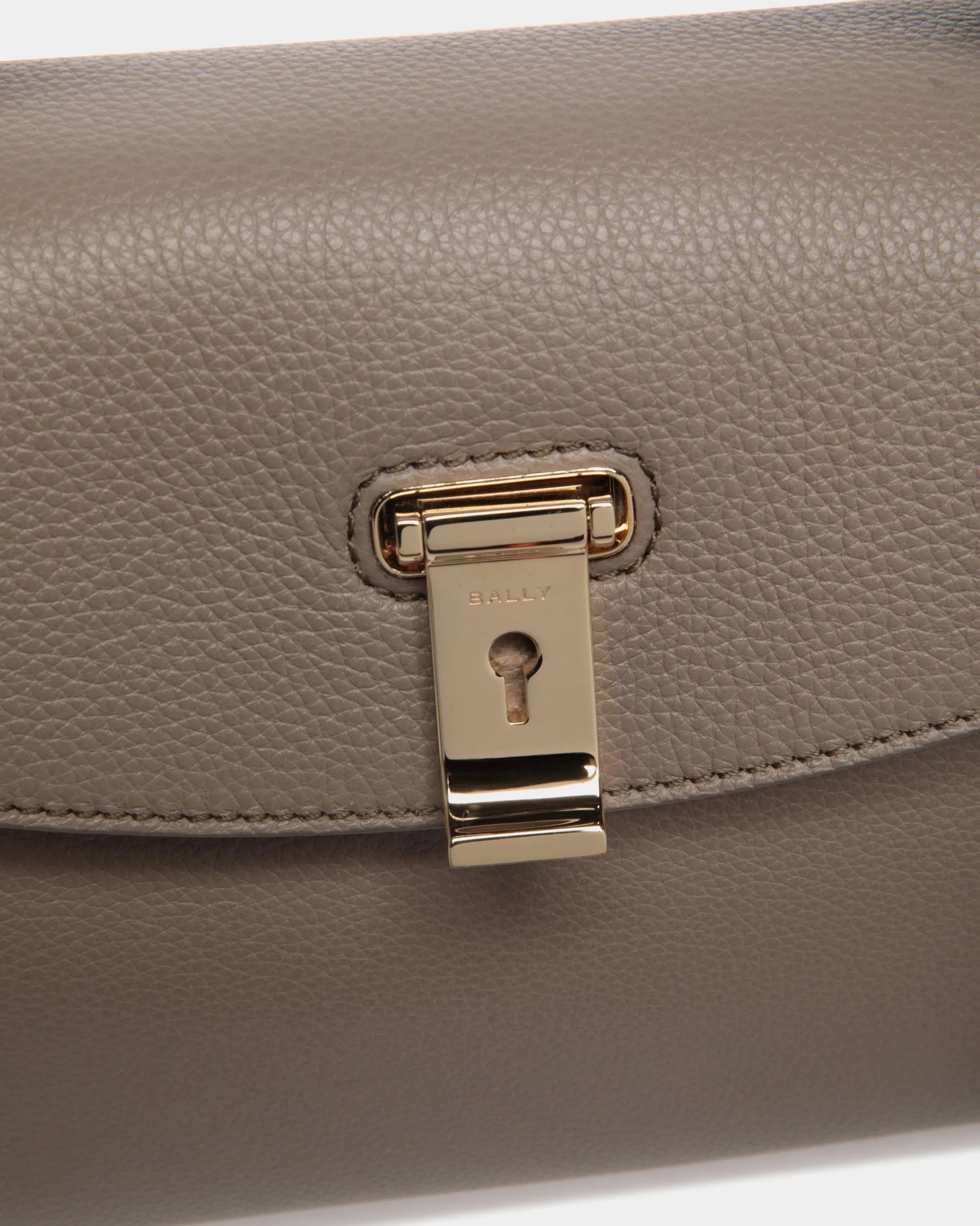 Lock Me Small Top Handle Bag In Taupe Grained Leather