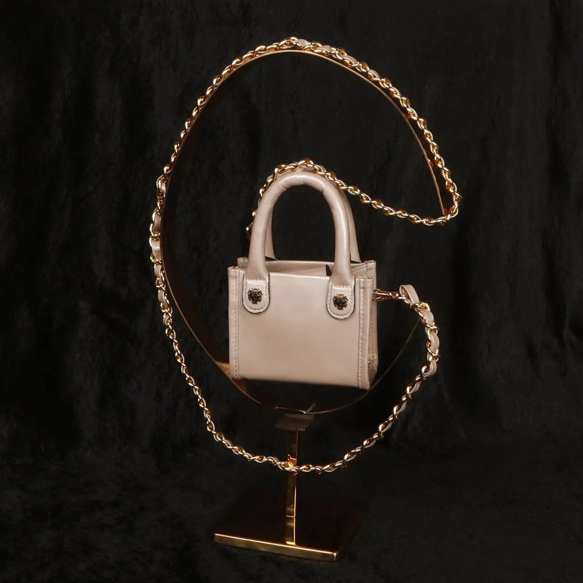 Micro Sized Beige Hand Bag in Patent Leather