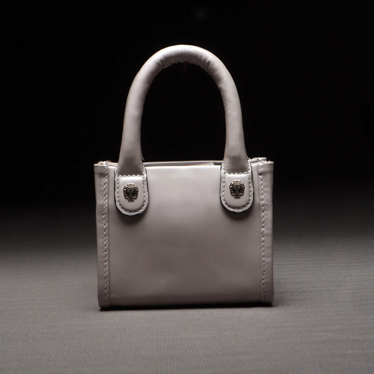 Micro Sized Beige Hand Bag in Patent Leather